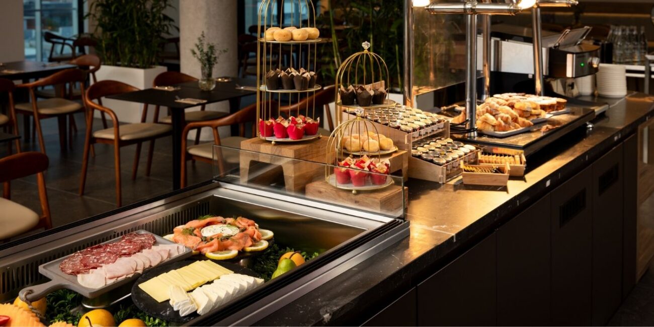 Daily buffet breakfast with pastries, fruit, smoked salmon, cheeses and cold meats at Ember & Vine in Mawson Lakes, Adelaide