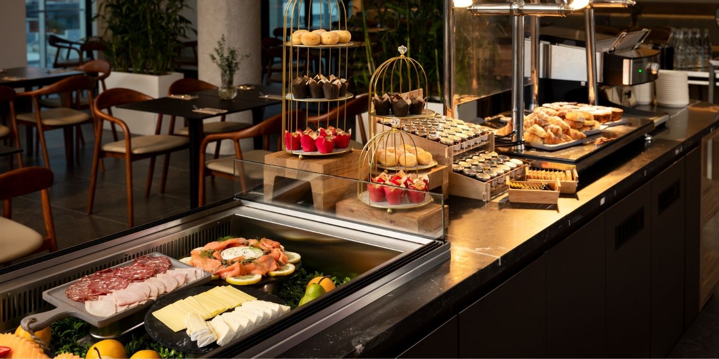 Daily buffet breakfast with pastries, fruit, smoked salmon, cheeses and cold meats at Ember & Vine in Mawson Lakes, Adelaide