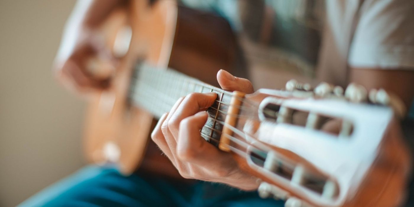 Acoustic guitar performance promoting live music at Ember & Vine in Mawson Lakes, Adelaide